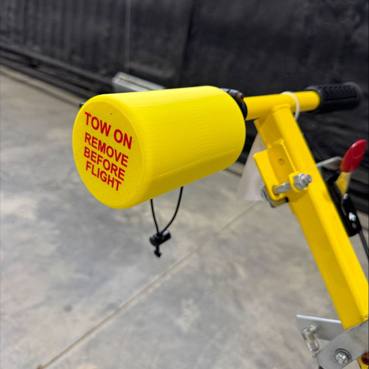 Tow On Remove Before Flight Cup