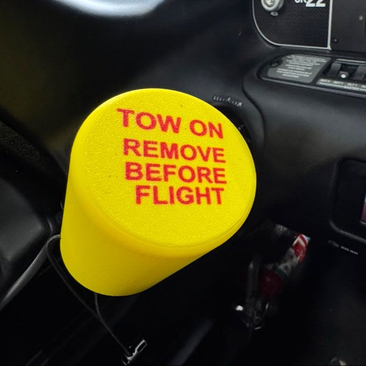 Tow On Remove Before Flight Cup