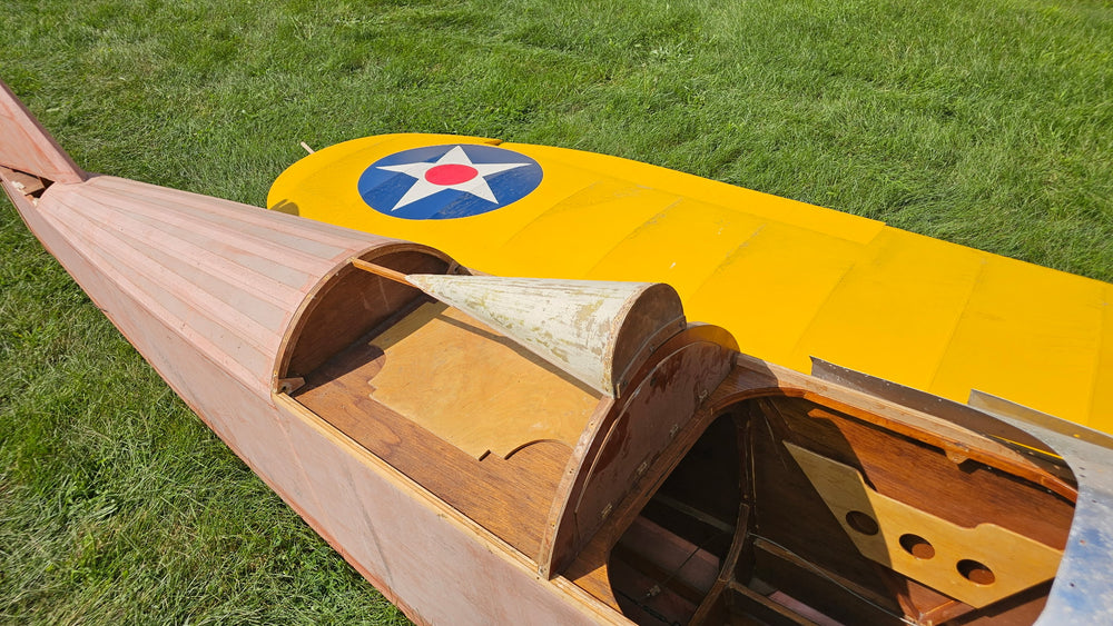 FlyBaby cockpit and rear fuselage beside covered wing